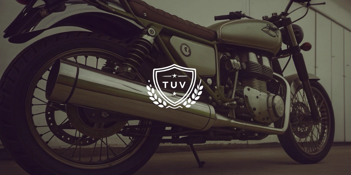 TÜV certified motorcycle exhaust system with documentation and certification marks