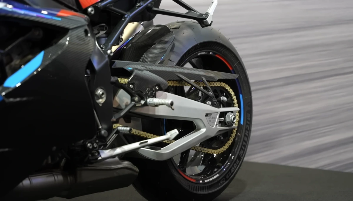 Display of Whaccessories products featuring motorcycle helmets and jackets with casino-themed designs